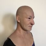 Tim ultra-realistic bald elderly male silicone mask with grey stubble beard for disguise and film FX